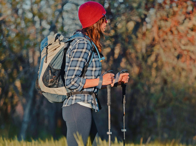 What are the benefits of trekking poles for hikers?